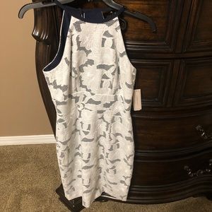 Navy dress with white lace overlay